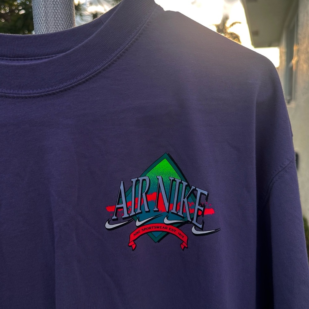 Nike Air Tee in Deep Purple with Graphic Logo